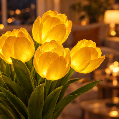 Gros plan des tulipes allumées aux pétales réalistes