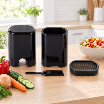 Découpeur de légumes manuel noir brillant avec sa grille ovale et son peigne de nettoyage